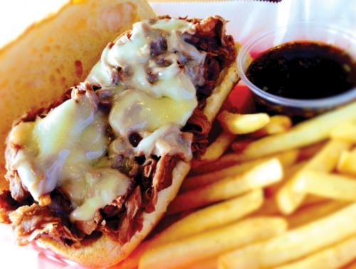 Cheese steak sandwich with fries